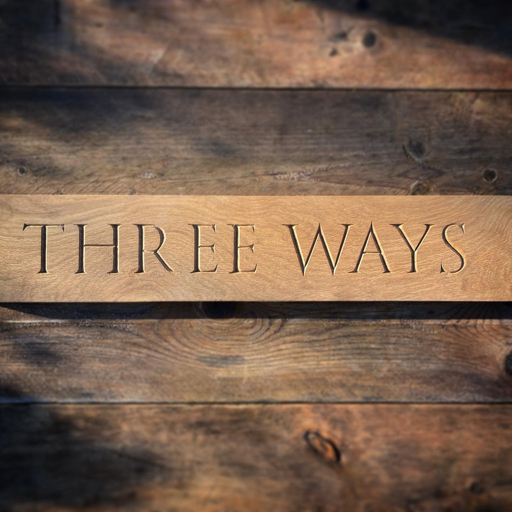 Carved House Sign