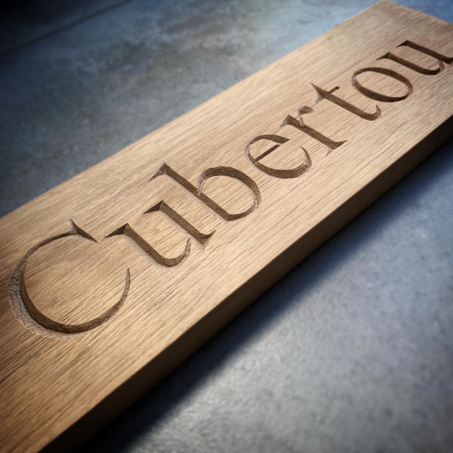 Carved House Sign