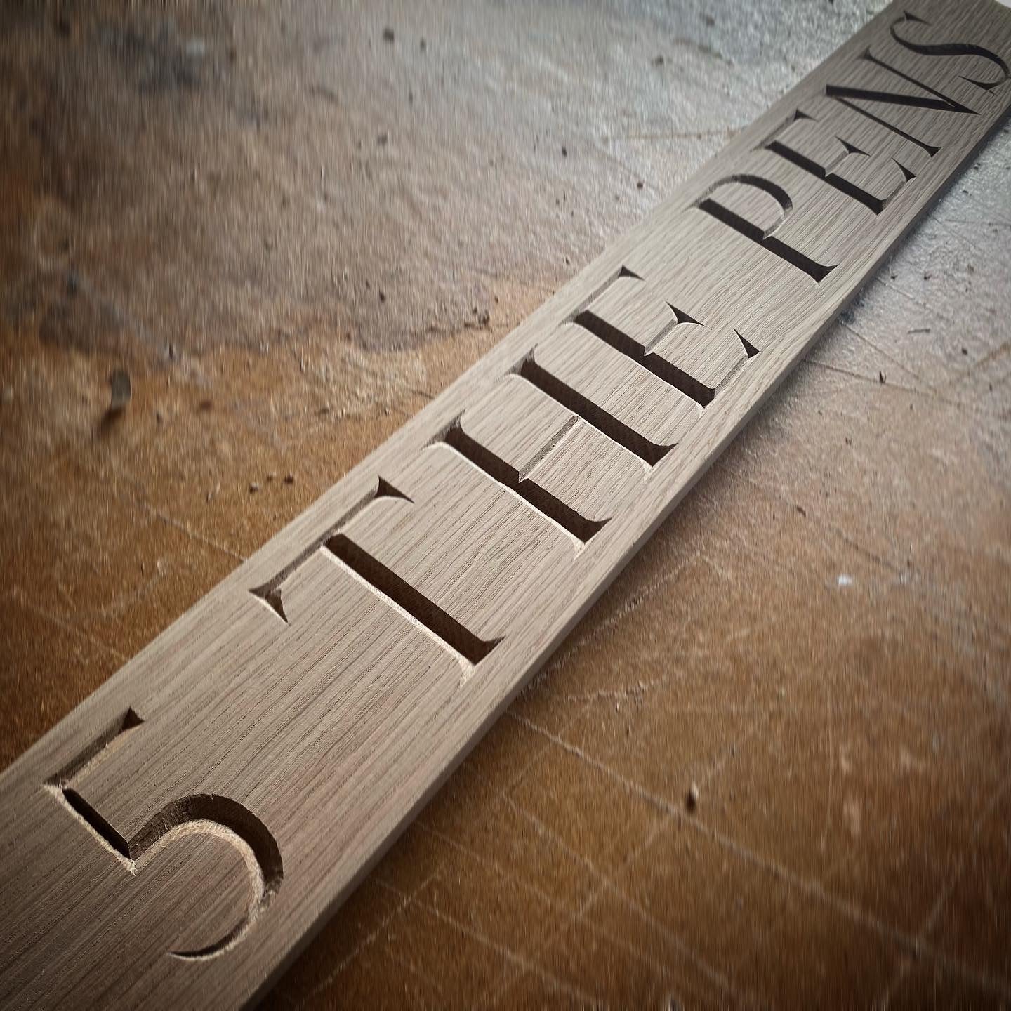 Carved House Sign