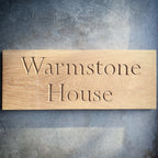 Carved House Sign