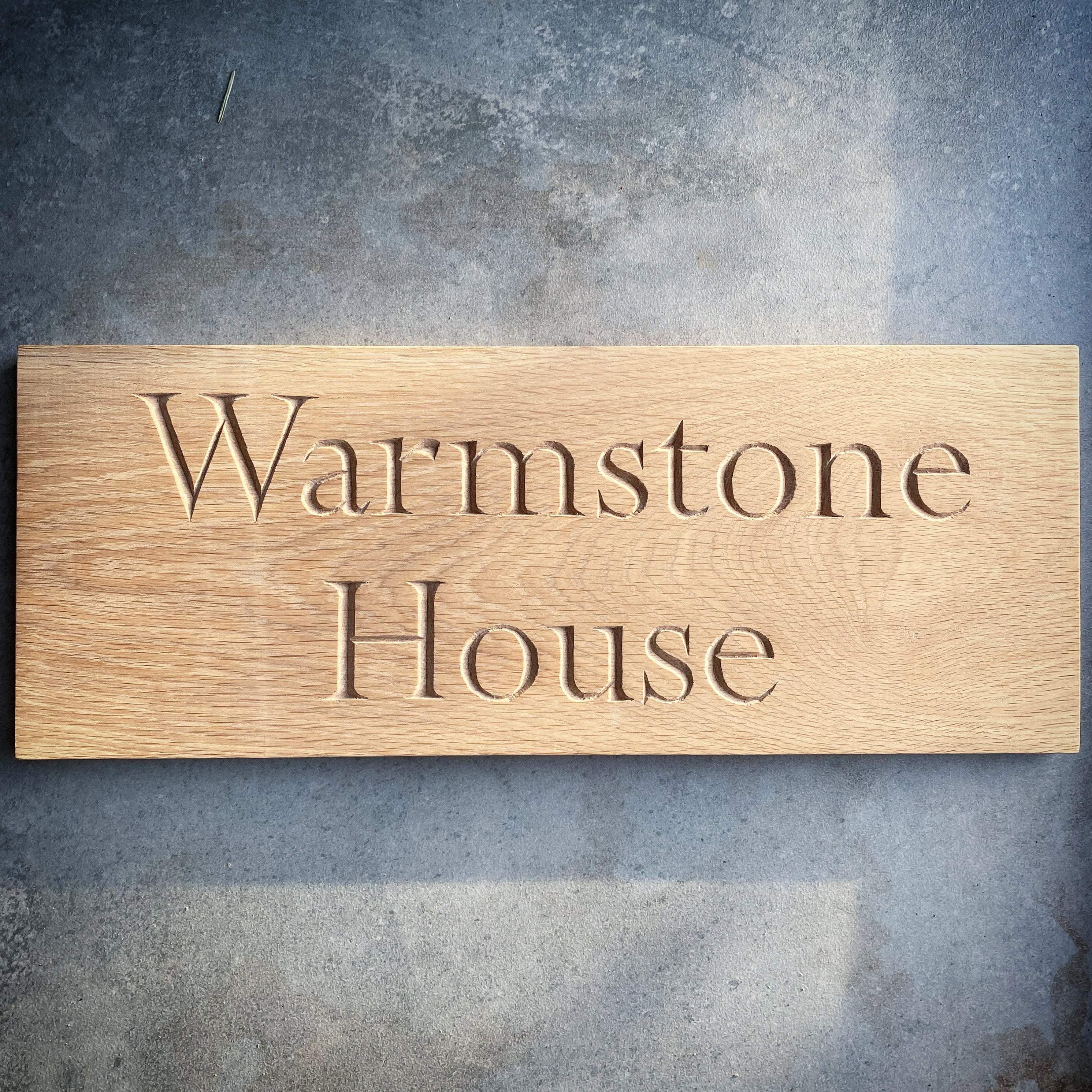 Carved House Sign