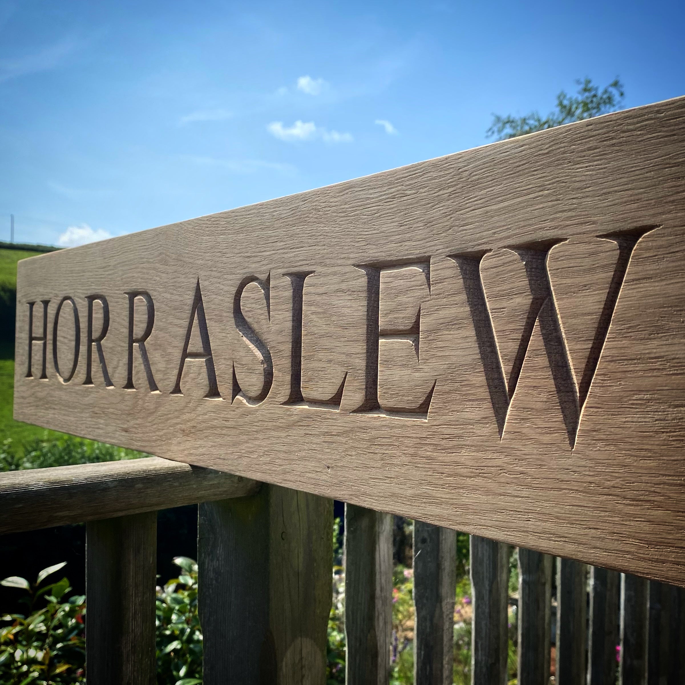 Carved House Sign
