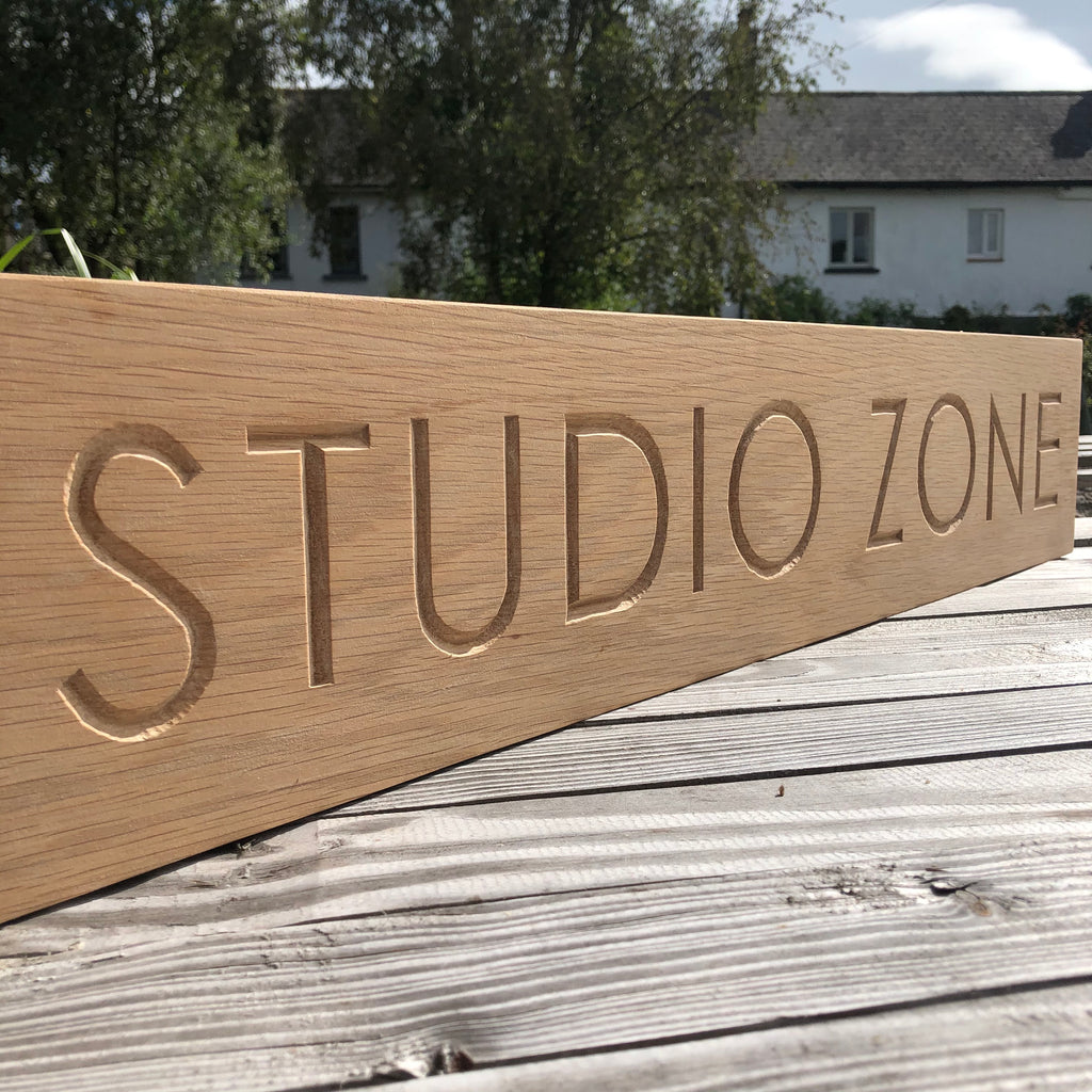 Carved House Sign