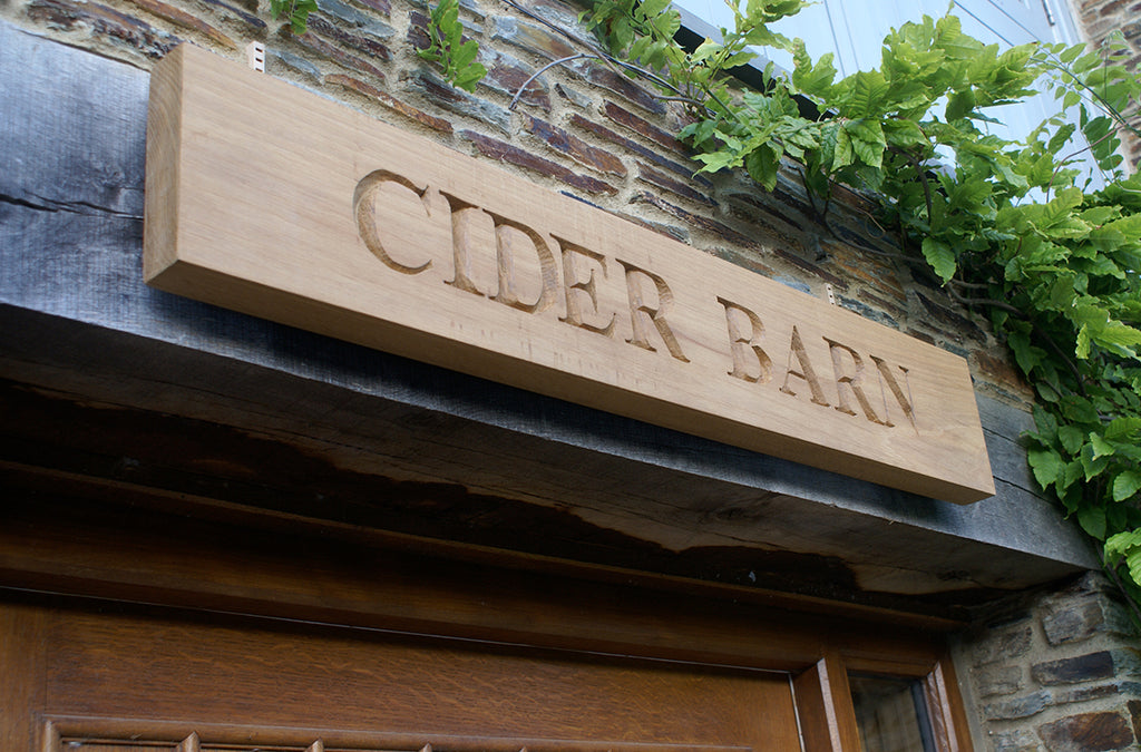 Carved House Sign