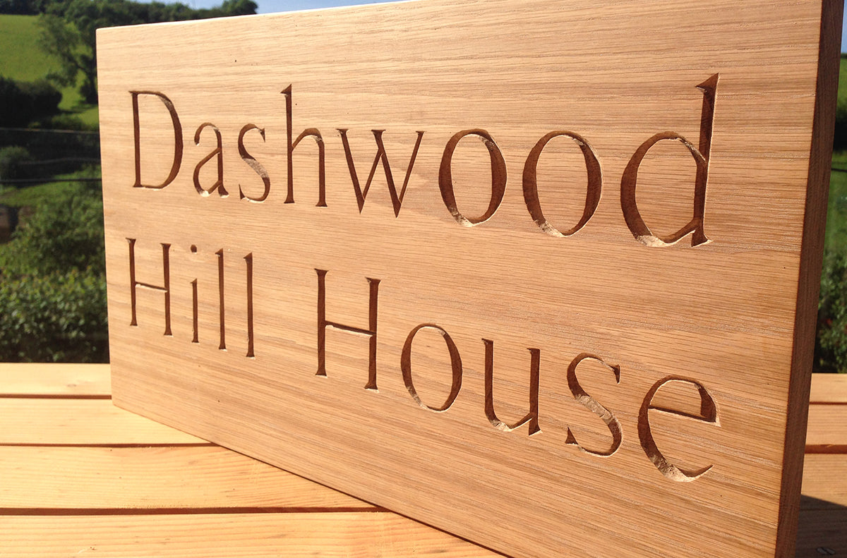 Carved House Sign