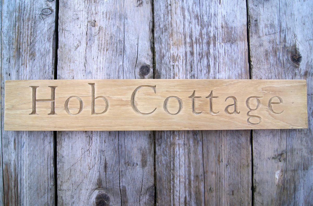 Carved House Sign