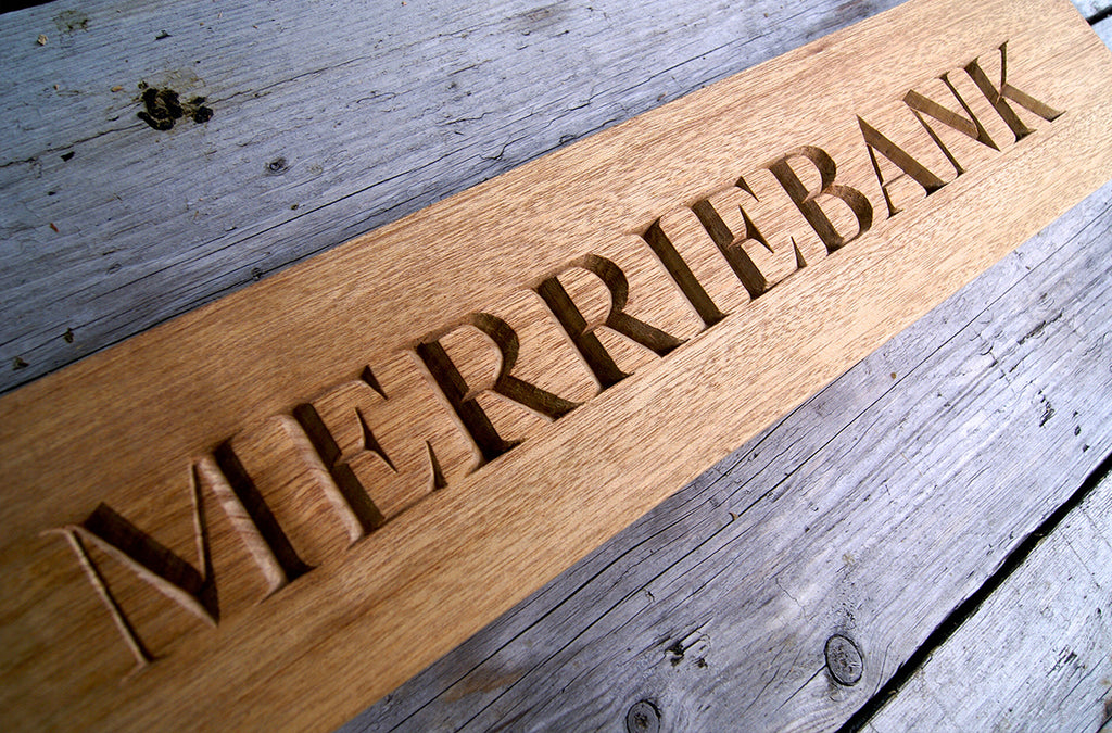 Carved House Sign
