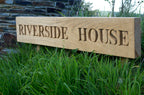 Carved House Sign