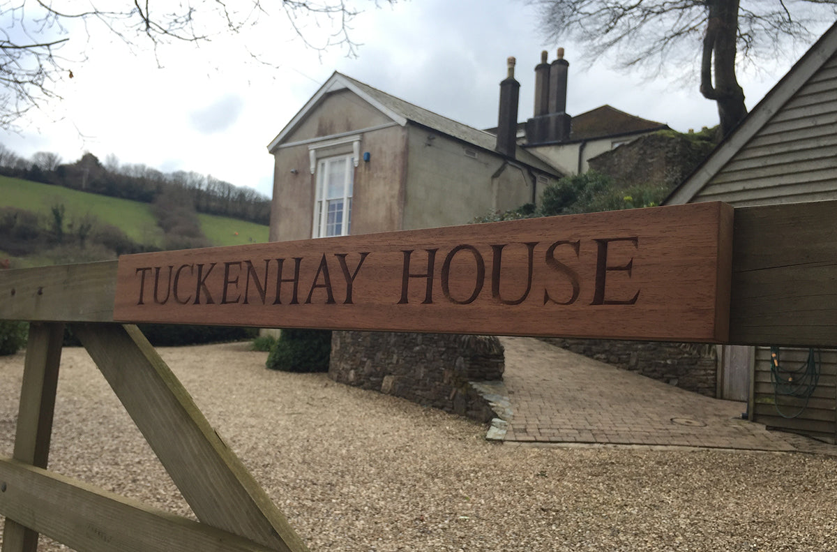 Carved House Sign